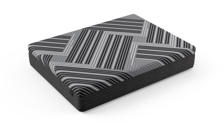 Copper Calm Hybrid mattress by Bamboo is Better shown on a white background, featuring a gray and black geometric pattern and plush hybrid construction.