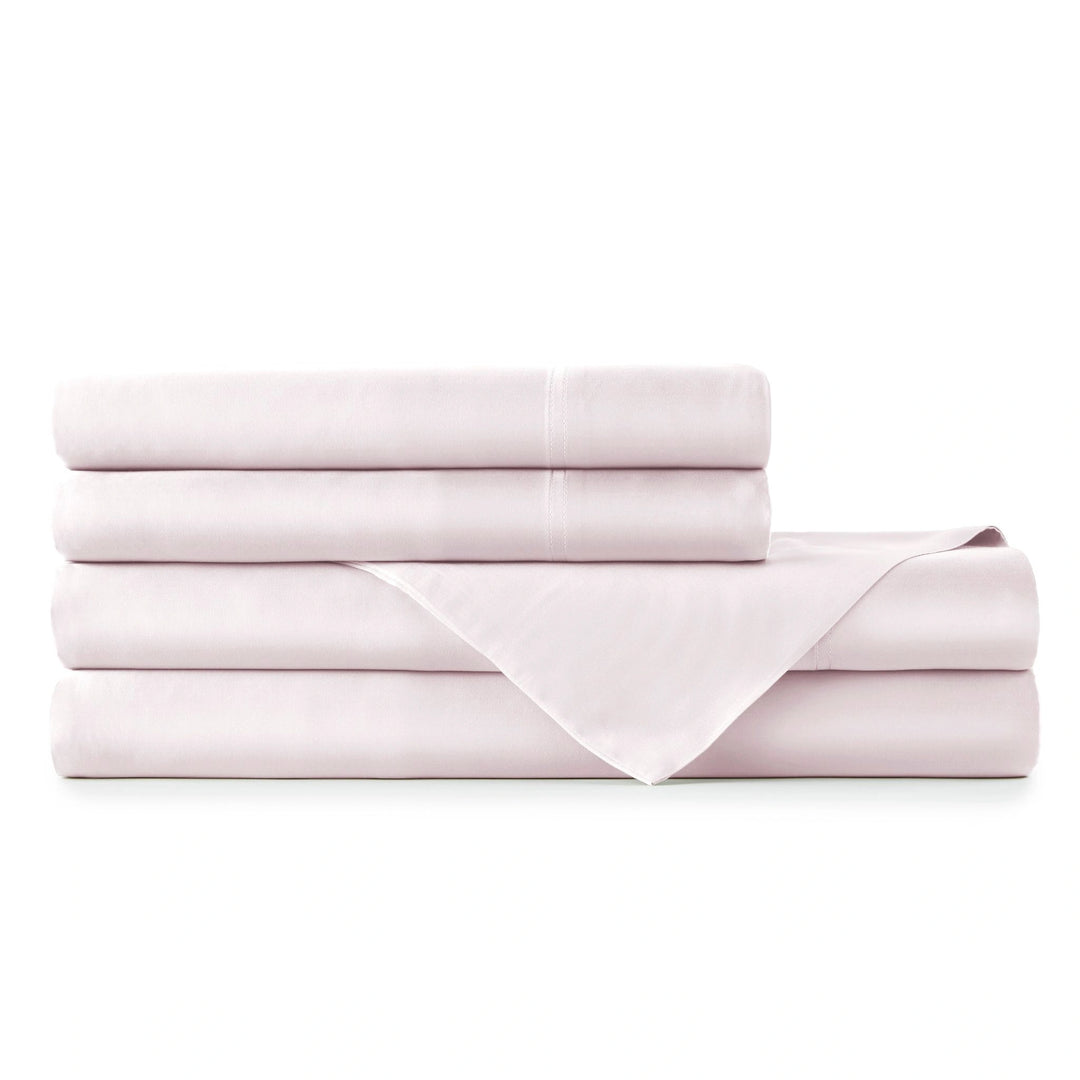 mauve bamboo bedding set from the Premium Collection, stacked to display pillowcases, sheets with smooth sateen finish