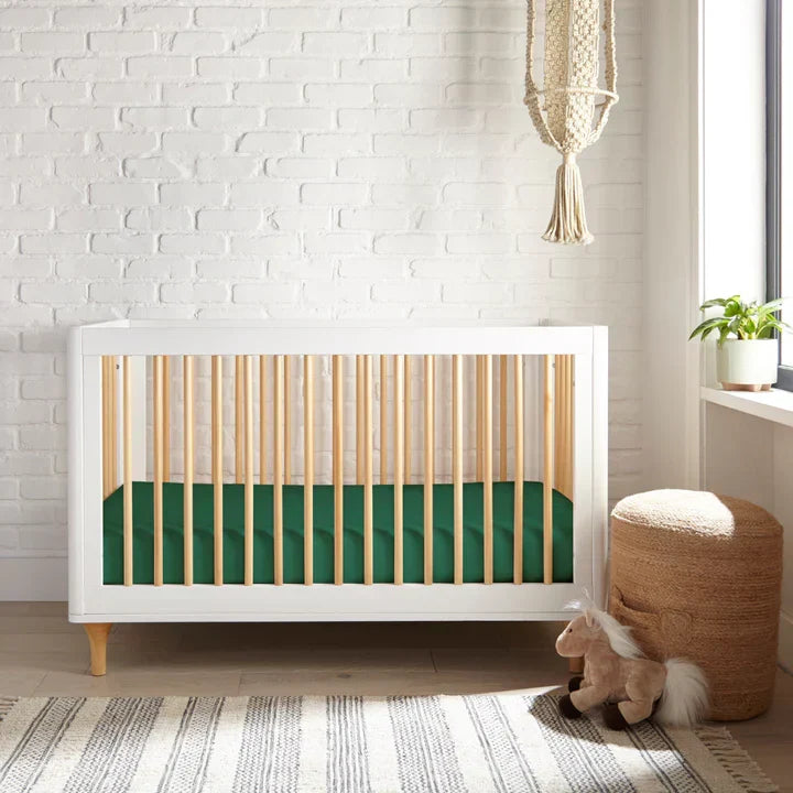 Soft bamboo crib sheets in a nursery setting.