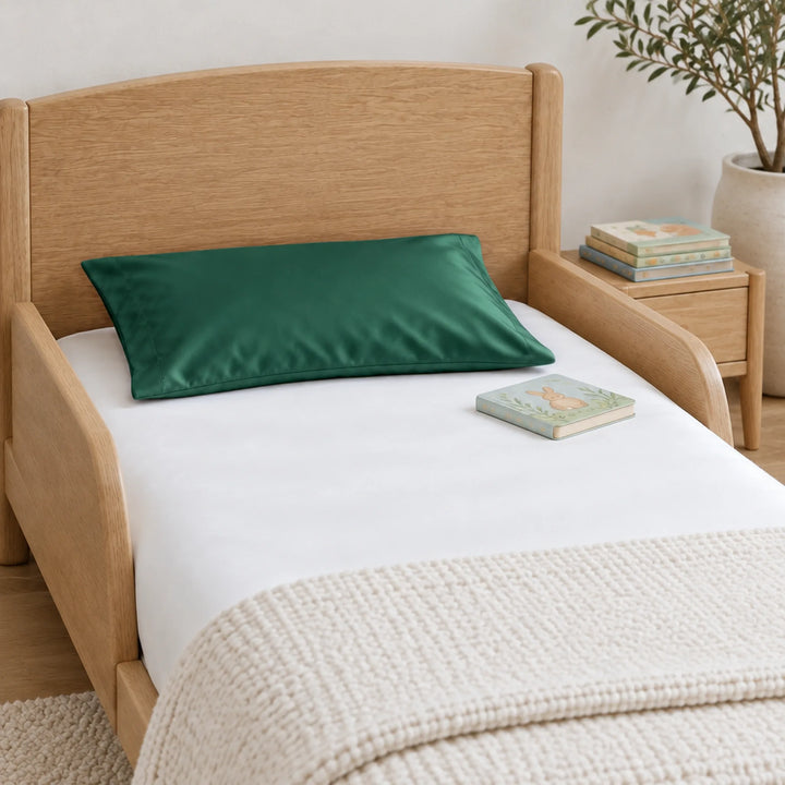 Emerald green bamboo viscose sateen toddler pillowcase, close-up