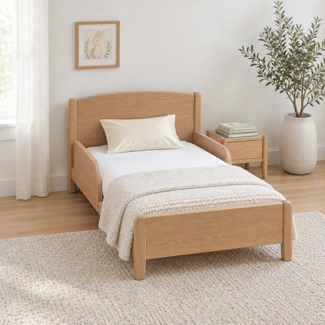 Ivory cooling bamboo viscose toddler pillowcase on a toddler bed in a calm, light nursery