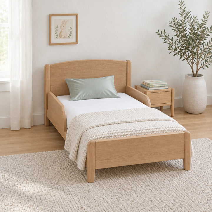 Silver cooling bamboo viscose toddler pillowcase on a toddler bed in a calm, light nursery