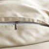 close-up of Cream bamboo pillowcase with hidden white zipper and smooth sateen finish