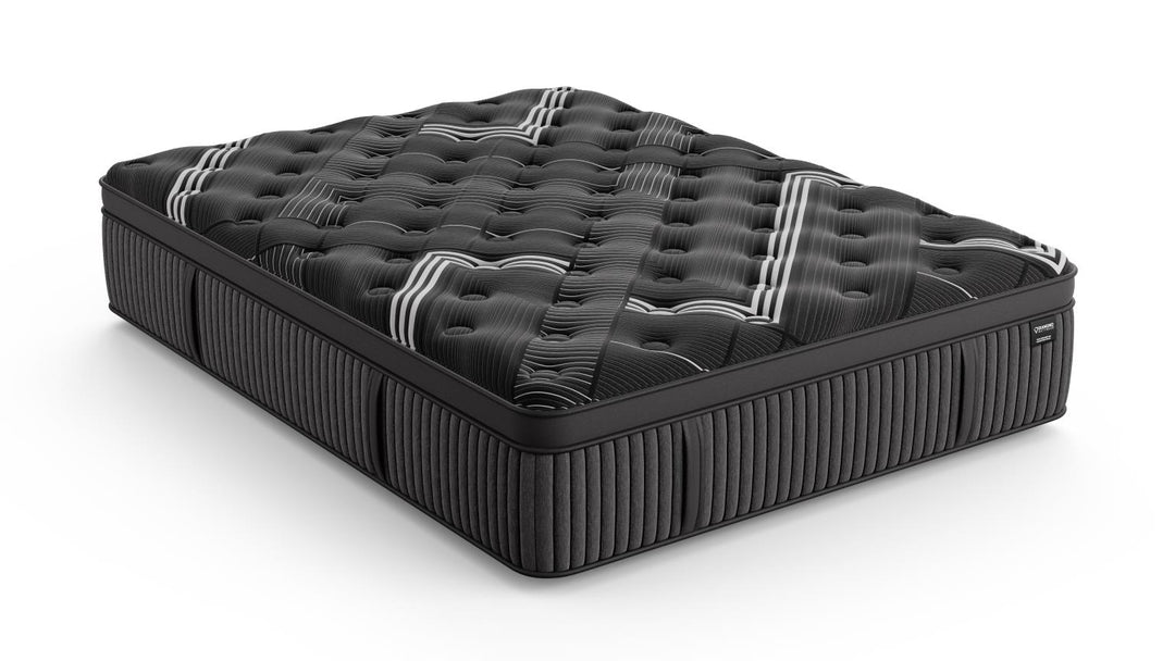 Angled view of the Graphene Cool 2.0 Hybrid Mattress highlighting its plush tufted surface, striped cooling design, and high-performance edge support on a white background.