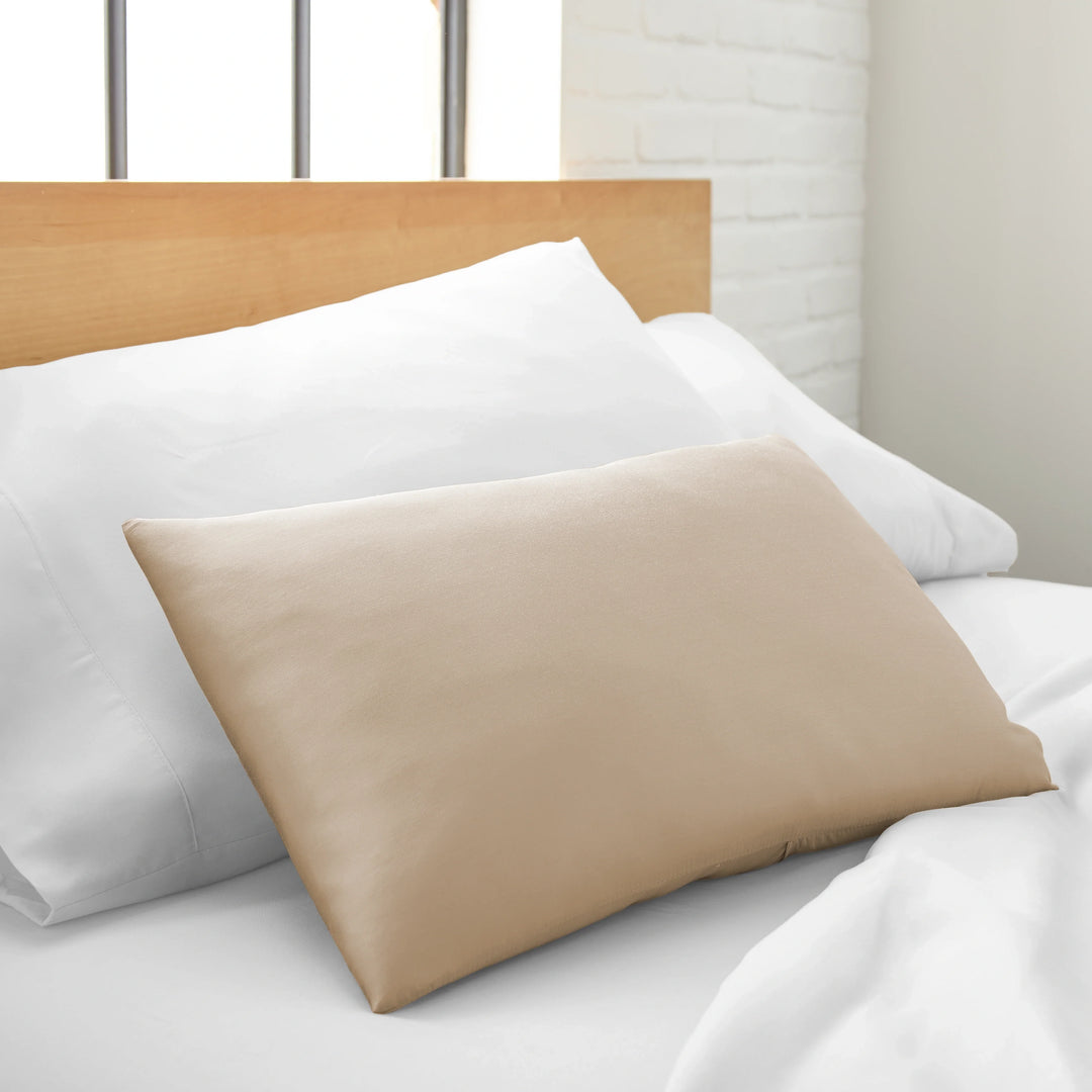 Taupe cooling bamboo spa pillowcase, silky sateen, styled on a bed