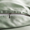 close-up of Sage bamboo pillowcase with hidden white zipper and smooth sateen finish