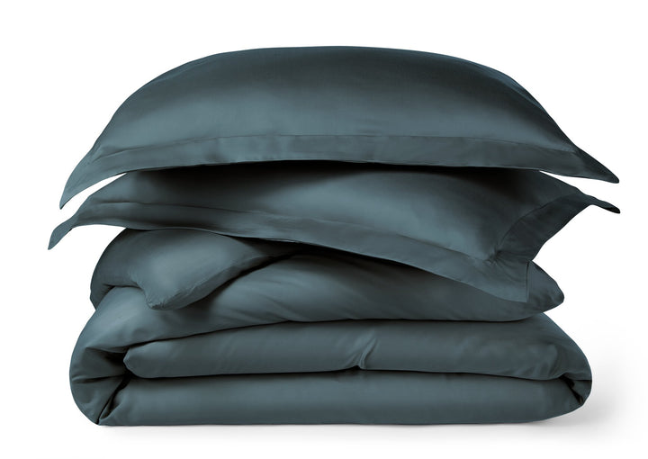 slate bamboo duvet cover from the Signature Collection, neatly folded and stacked on a clean studio background
