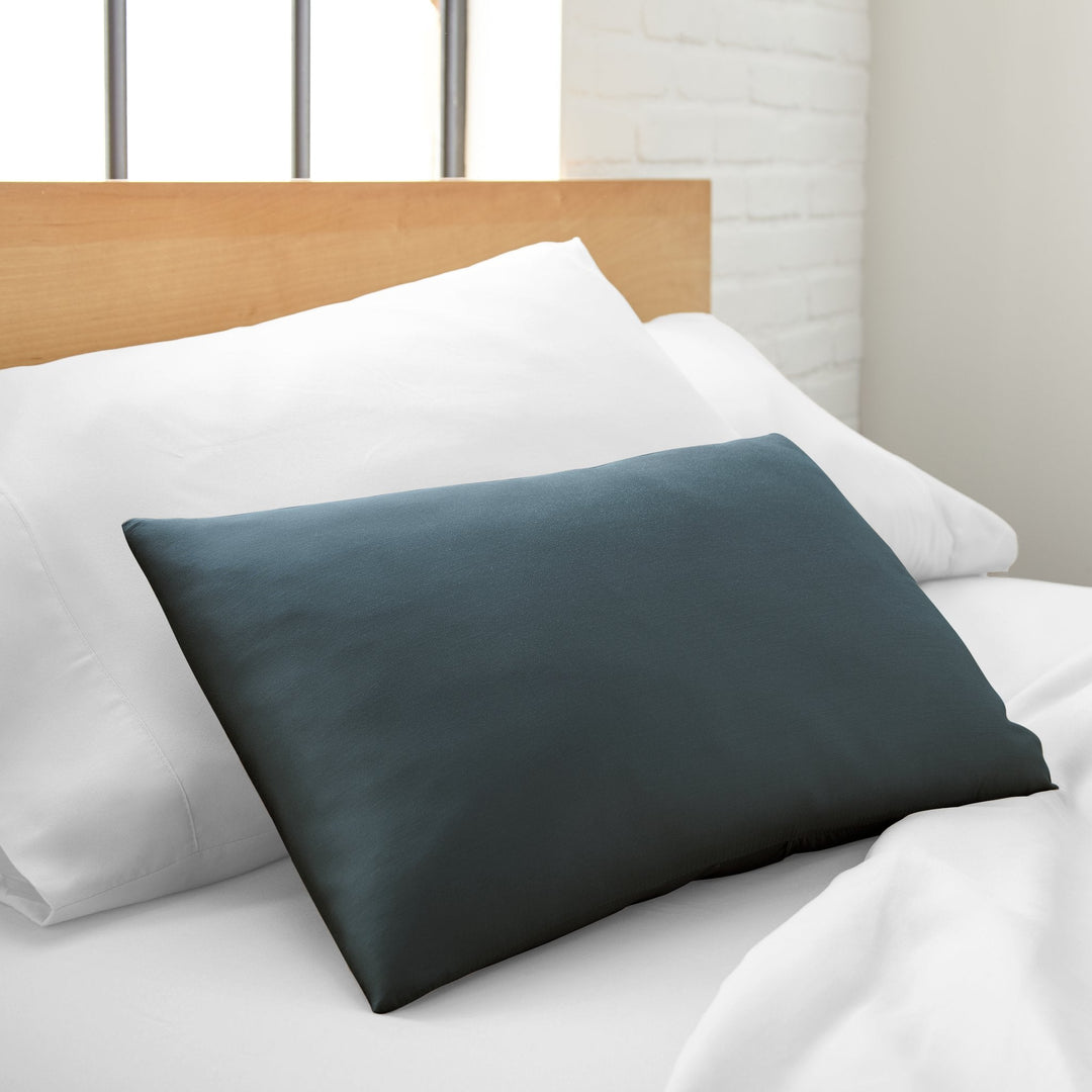 Slate cooling bamboo spa pillowcase, silky sateen, styled on a bed