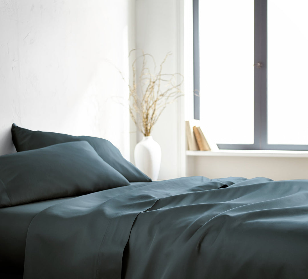 Slate Signature Flat Sheet — silky sateen drape, side view