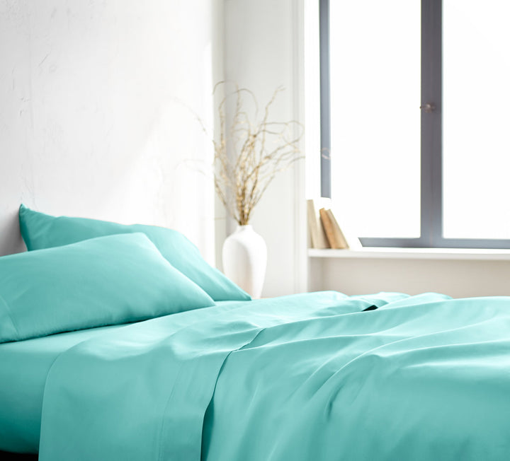 Tiffany Blue Signature Flat Sheet — silky sateen drape, side view