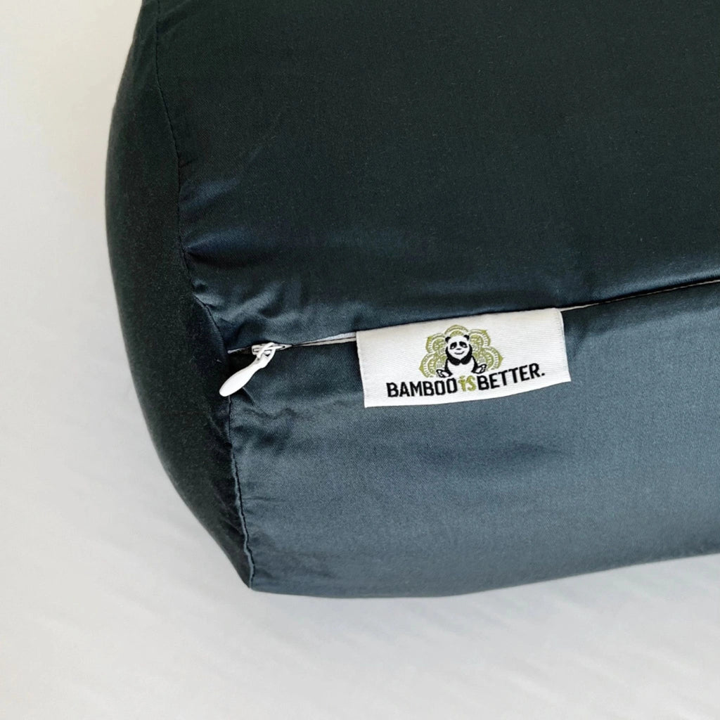 Close-up of bamboo bolster pillowcase showing the stitched brand tag for a clean, premium finish