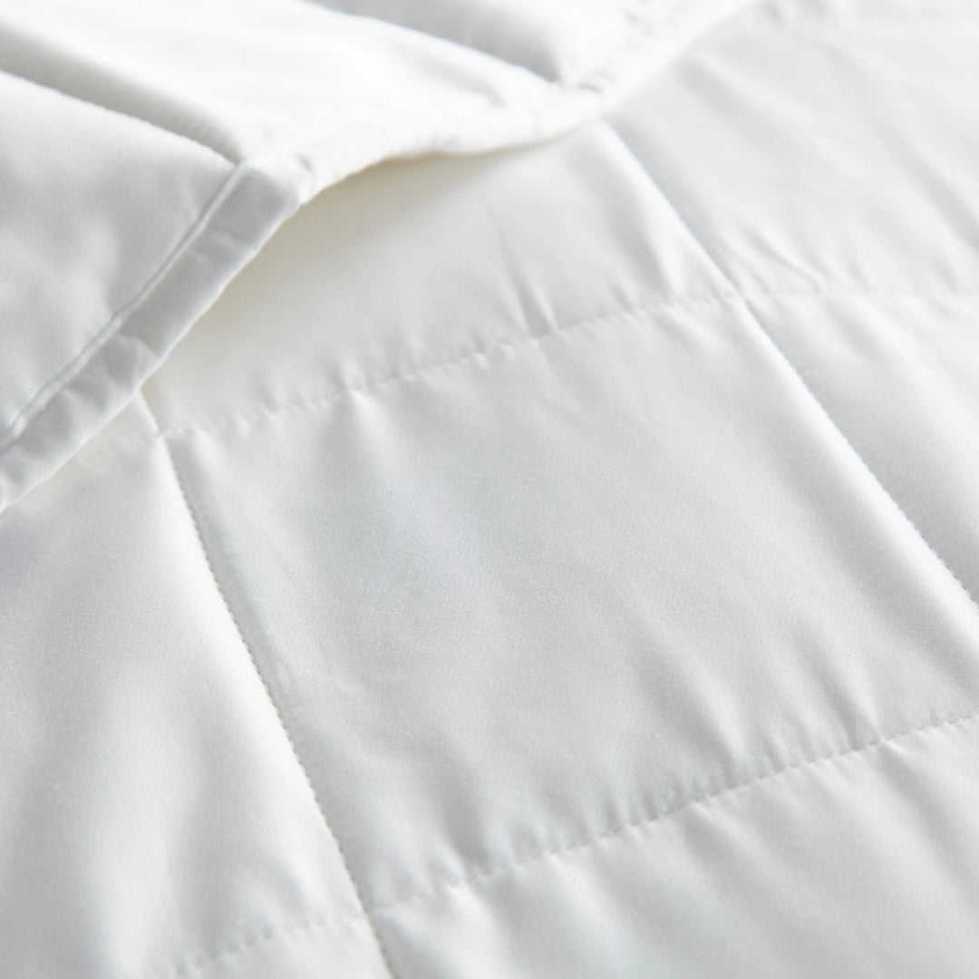 Stitching and fabric texture of bamboo weighted blanket for durability and even weight distribution