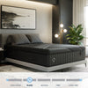 Side view of the Black Diamond Hybrid Mattress on a modern bed with gray bedding, soft lighting, and minimalist decor.