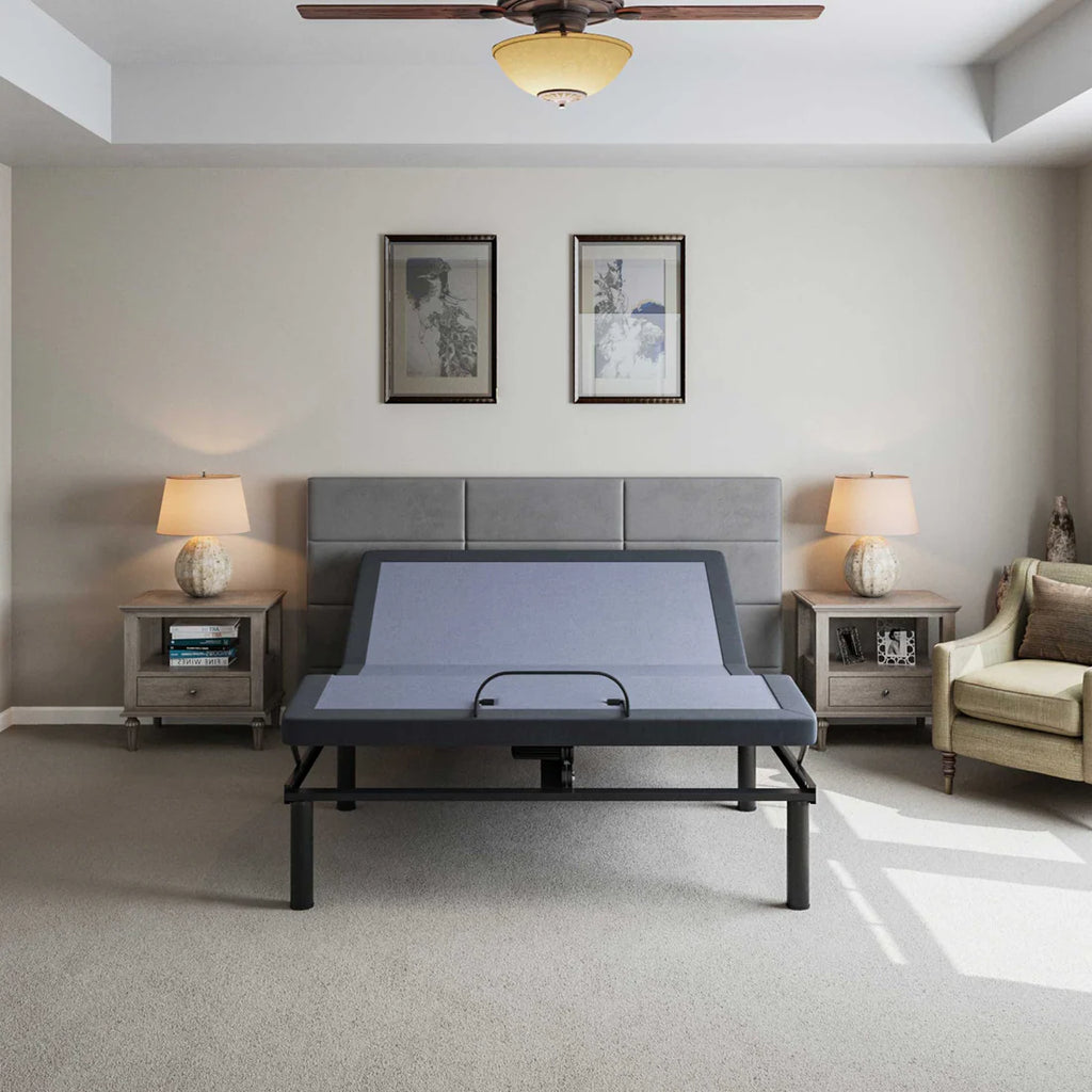 BT2000 adjustable bed base by Bamboo is Better shown in a modern bedroom with gray headboard, nightstands, and lamps.