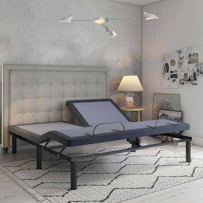 BT3000 adjustable bed base by Bamboo is Better shown from side angle with head elevated in a gray bedroom with tufted headboard and modern wall decor.