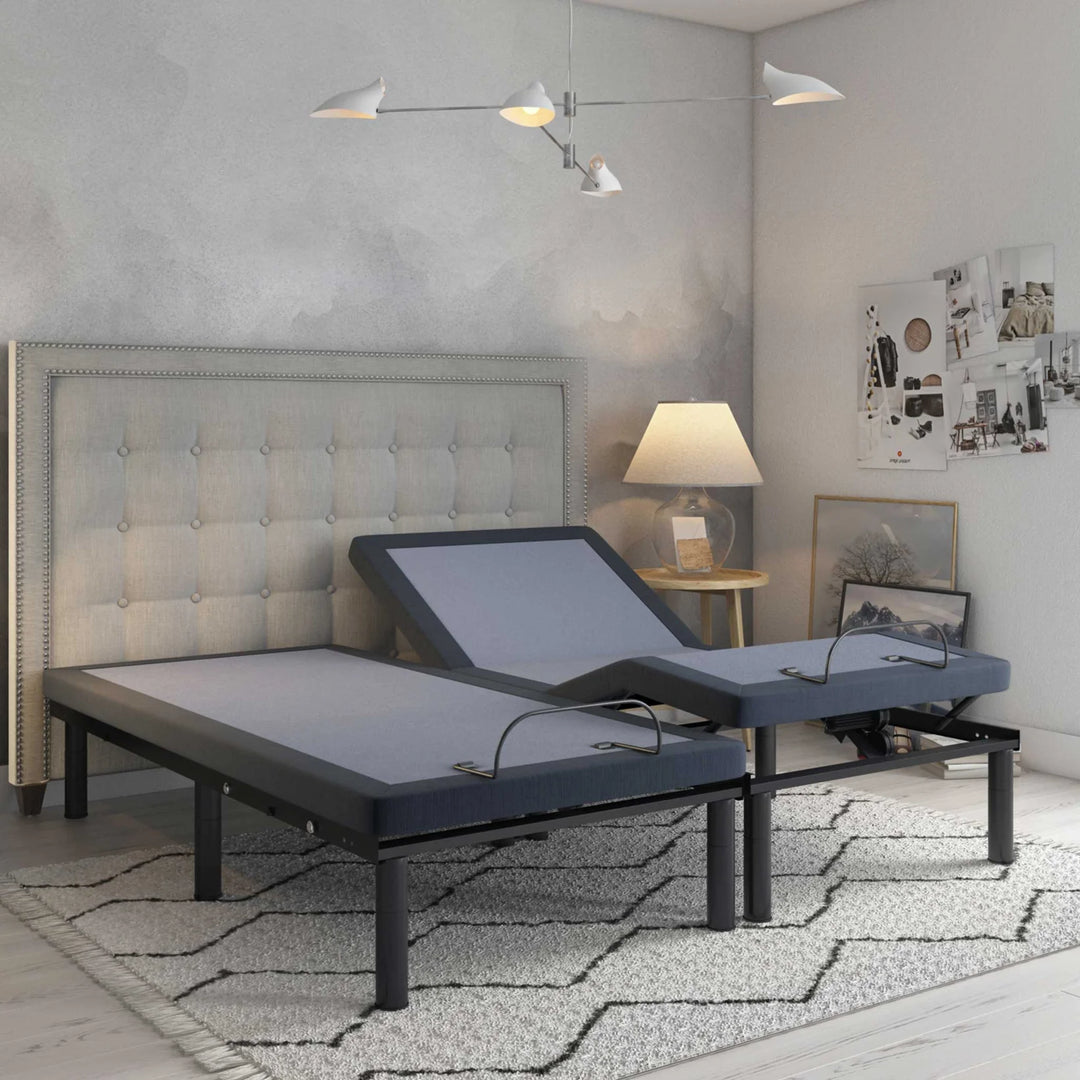 BT3000 split king adjustable bed base by Bamboo is Better shown with one side raised in a modern gray bedroom with tufted headboard and warm lighting.