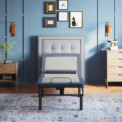BT6500 Twin XL adjustable bed base by Bamboo is Better shown from the front with head elevated in a modern bedroom with blue walls and framed artwork.