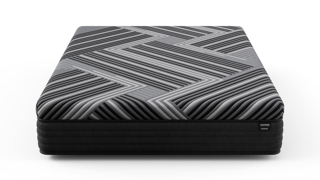 Front view of the Copper Calm Hybrid mattress by Bamboo is Better, featuring a gray and black geometric cover on a white background.