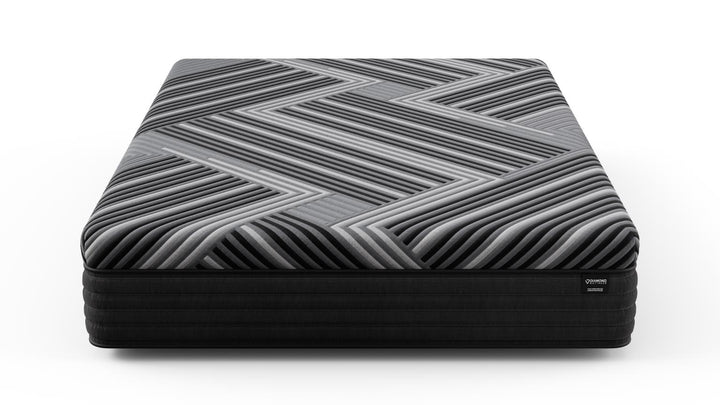 Front view of the Copper Calm Hybrid mattress by Bamboo is Better, featuring a gray and black geometric cover on a white background.