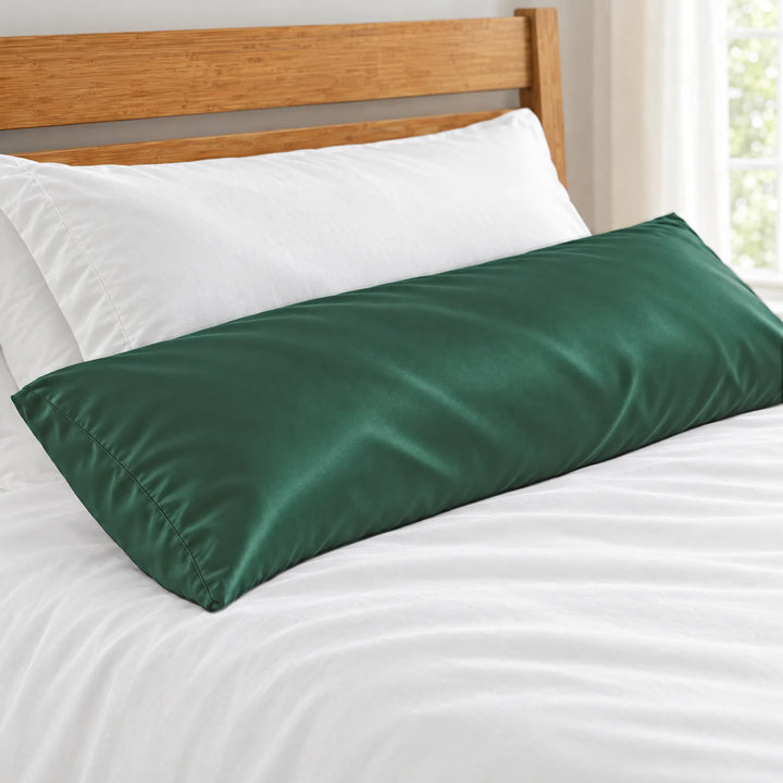 Emerald Green bamboo viscose sateen body pillowcase close-up on a body pillow beside a white sleeping pillow, silky sateen finish