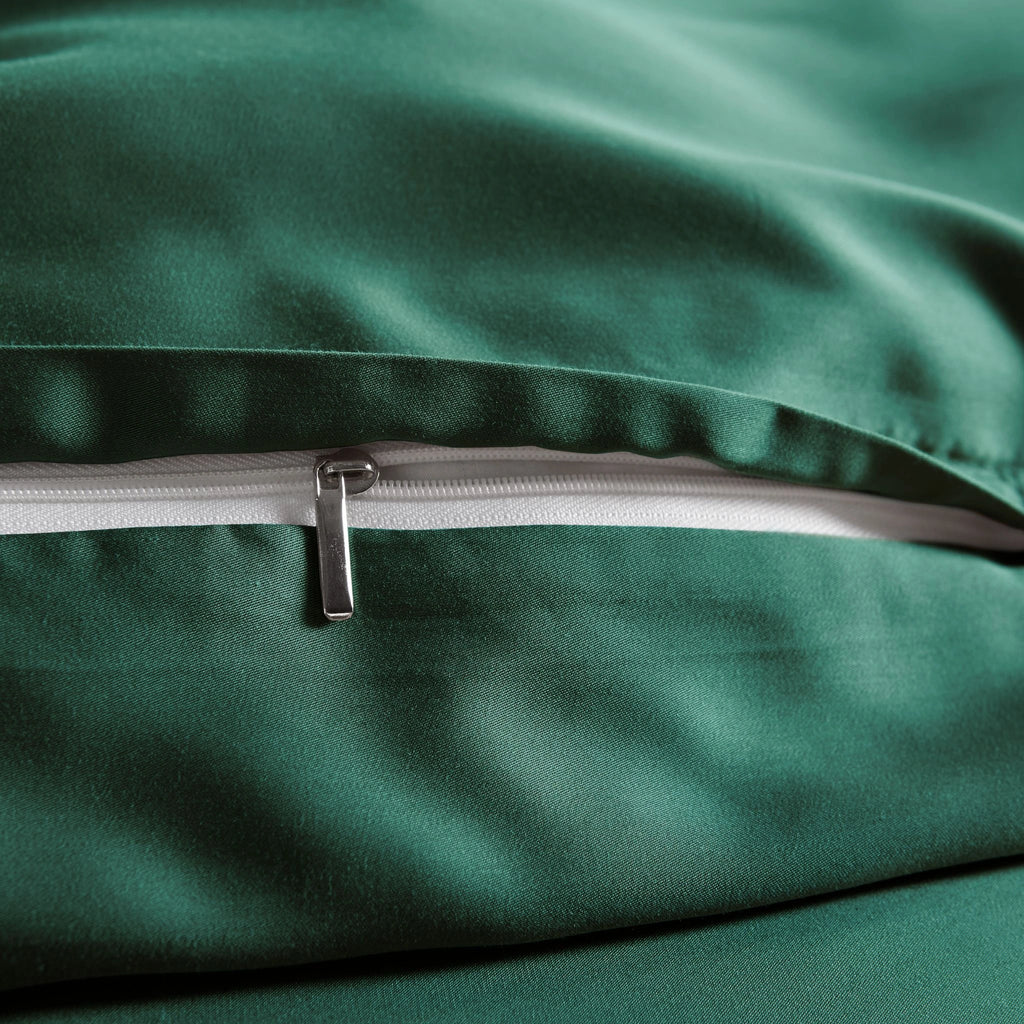 close-up of emerald green bamboo pillowcase with hidden emerald green zipper and smooth sateen finish