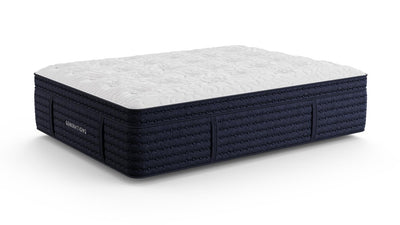 Angled render of the Generations 2.0 Luxe Hand-Tufted Latex Hybrid Mattress showing white quilted Tencel top and navy base on a white background