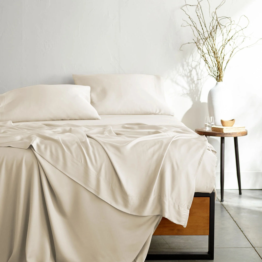 ivory bamboo bed sheets from the Signature Collection, shown from the foot of the bed — the same sheets supplied in Split Cal King