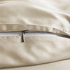 close-up of ivory bamboo pillowcase with hidden white zipper and smooth sateen finish