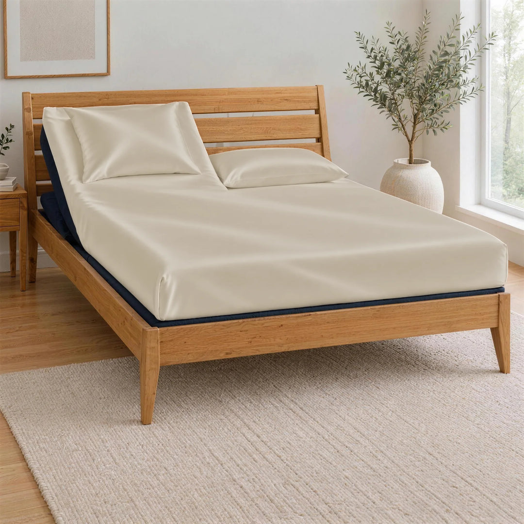 Ivory bamboo viscose Top Split King fitted sheet on one king mattress split at the head, BT3000 Split Top King base in a Greenington Sienna bamboo frame