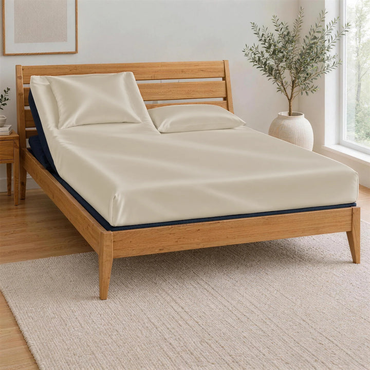 Ivory bamboo viscose Top Split King fitted sheet on one king mattress split at the head, BT3000 Split Top King base in a Greenington Sienna bamboo frame