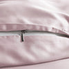 close-up of mauve bamboo pillowcase with hidden mauve zipper and smooth sateen finish