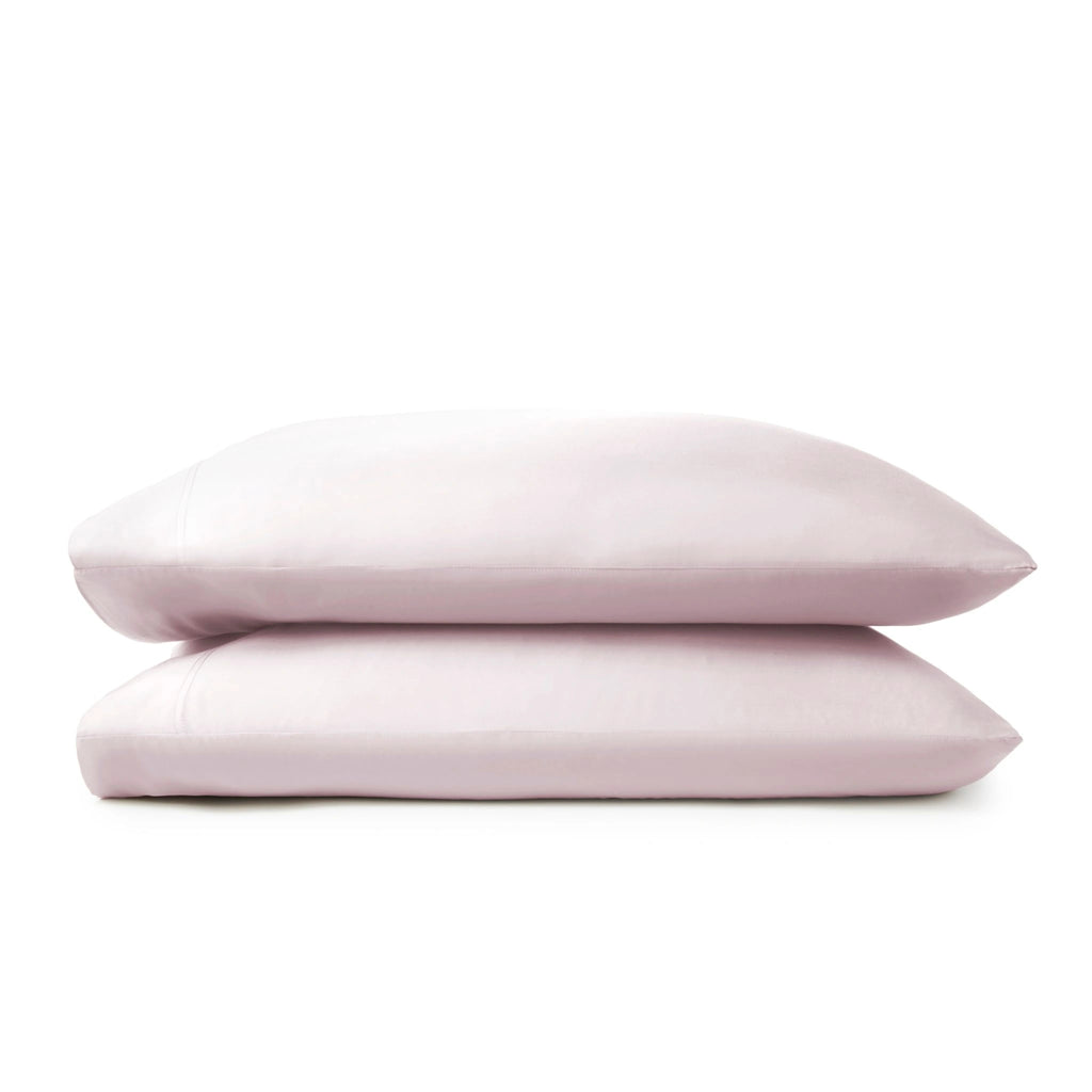 mauve bamboo pillowcases from the Premium Collection, clean stacked display on mauve background with stitching detail visible