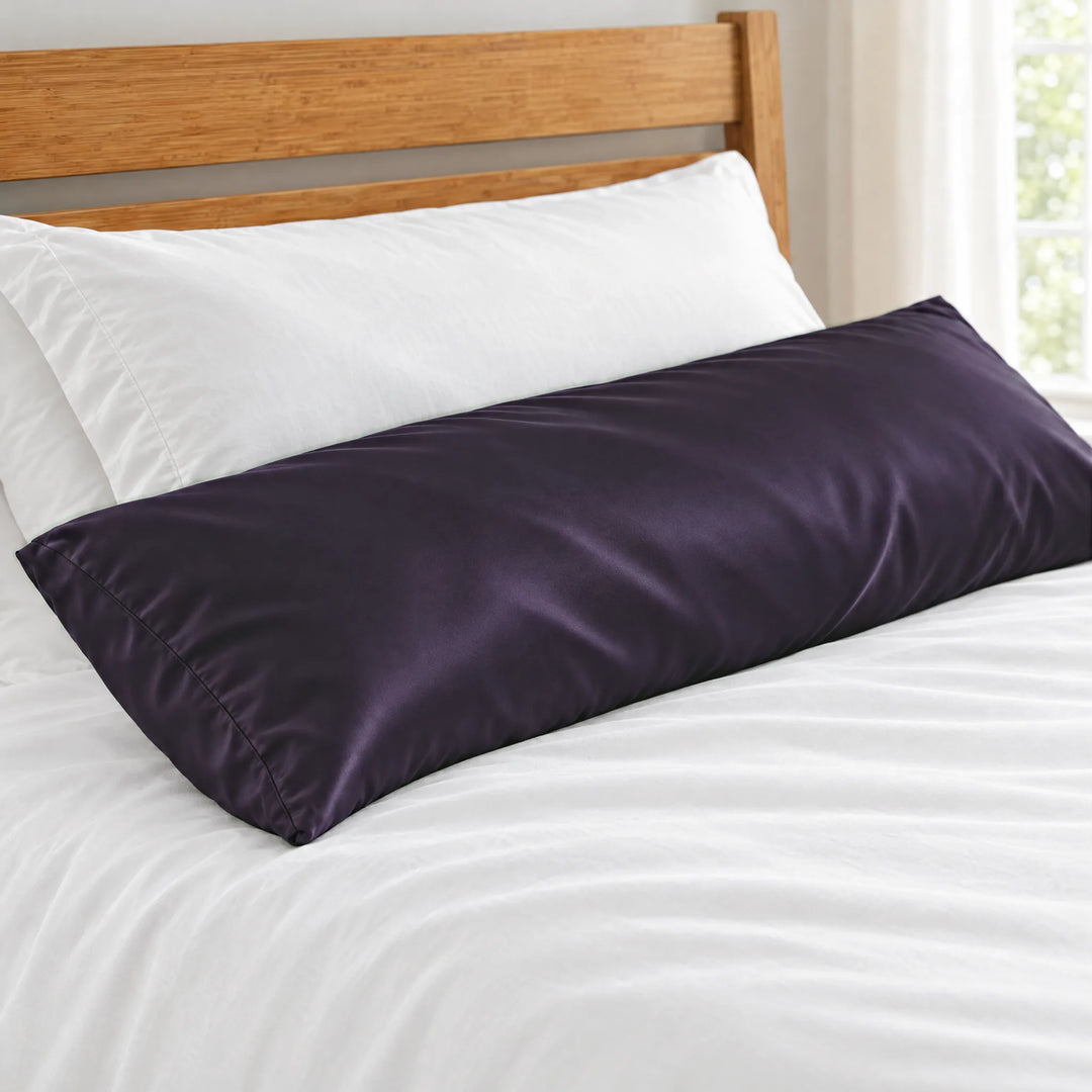 Royal Purple bamboo viscose sateen body pillowcase close-up on a body pillow beside a white sleeping pillow, silky sateen finish