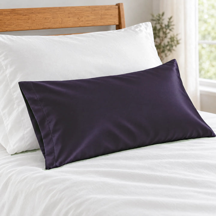 Royal Purple bamboo viscose sateen lumbar pillowcase close-up on white bedding showing the silky sateen finish and stitched hem