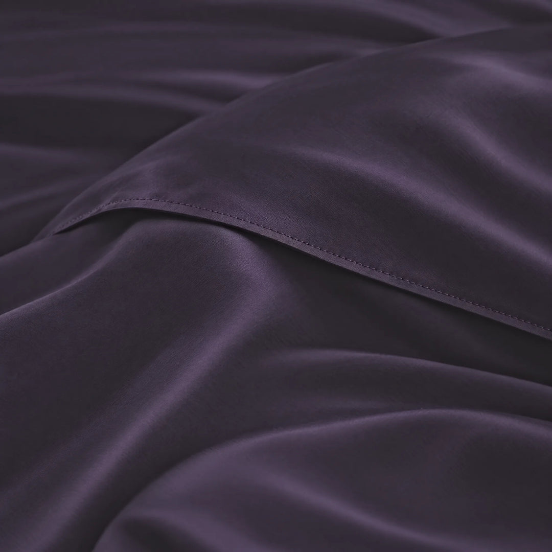 Royal Purple bamboo viscose sateen lumbar pillowcase macro close-up of silky sateen folds and stitched hem