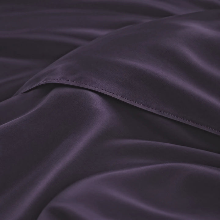 Royal Purple bamboo viscose sateen lumbar pillowcase macro close-up of silky sateen folds and stitched hem