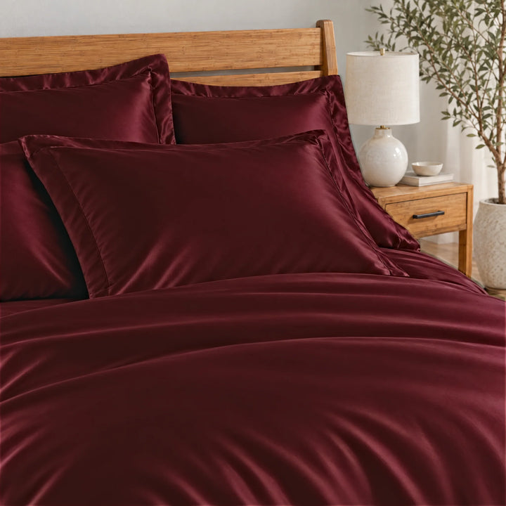 Ruby Red bamboo viscose Signature duvet cover, close-up of the matching pillow shams in smooth silky sateen