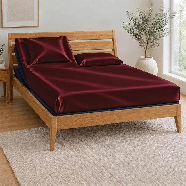Ruby red bamboo viscose Top Split King fitted sheet on one king mattress split at the head, BT3000 Split Top King base in a Greenington Sienna bamboo frame