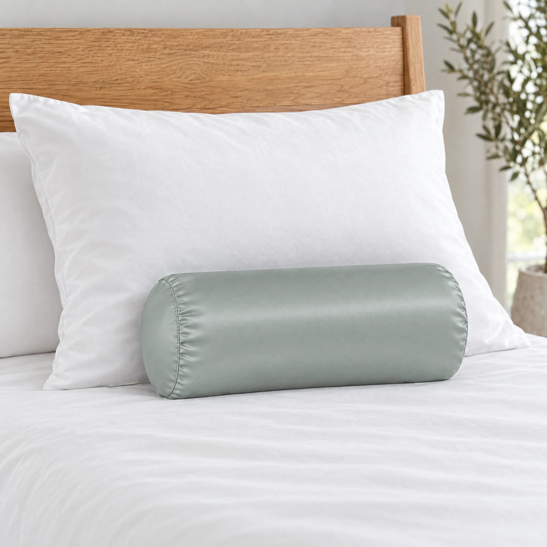 Silver bamboo viscose sateen bolster pillowcase (18 x 8 in) in front of a queen pillow to show true size