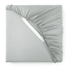 silver bamboo sateen fitted sheet corner with white elastic strap, showing snug fit and smooth fabric texture