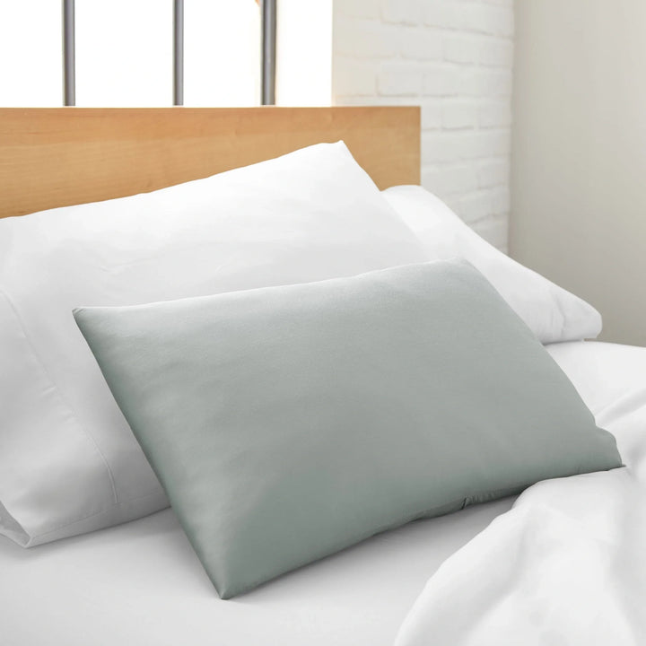 Silver cooling bamboo spa pillowcase, silky sateen, styled on a bed