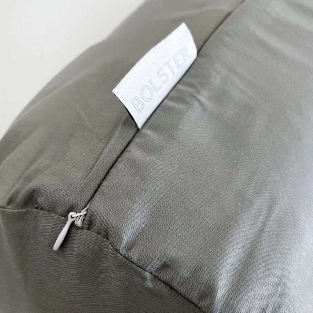 Close-up of bamboo pillowcase showing zipper detail 