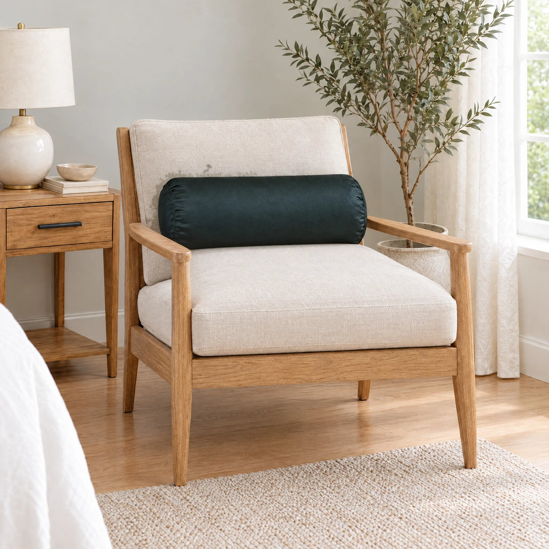 Slate bamboo viscose sateen bolster pillowcase on an oak armchair