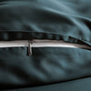 close-up of slate bamboo pillowcase with hidden white zipper and smooth sateen finish