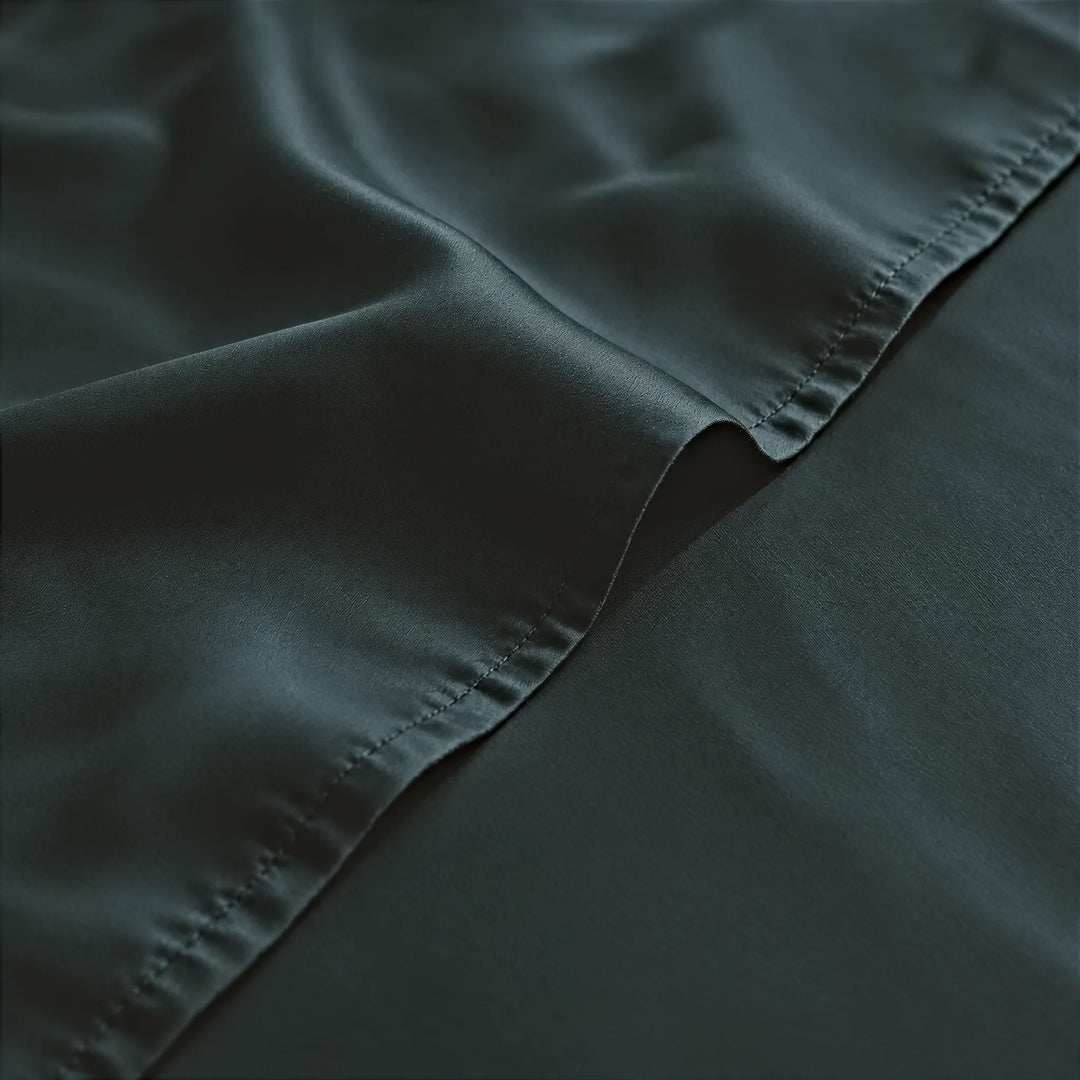 Slate bamboo viscose sateen weave close-up with hem stitching