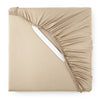 taupe bamboo sateen fitted sheet corner with white elastic strap, showing snug fit and smooth fabric texture
