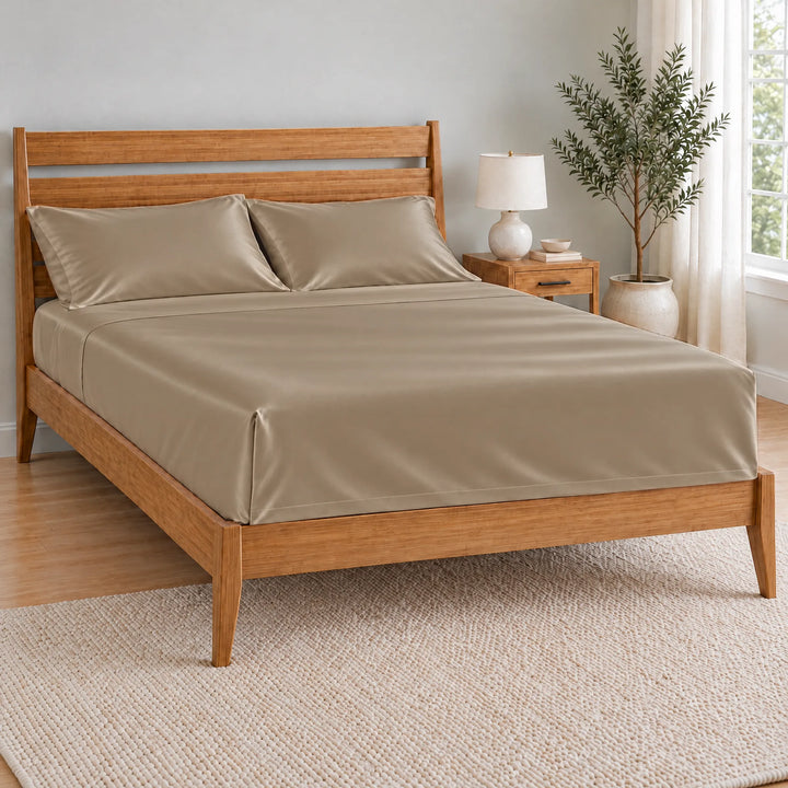 Taupe bamboo viscose flat sheet tucked with a neat hospital corner on a bamboo bed