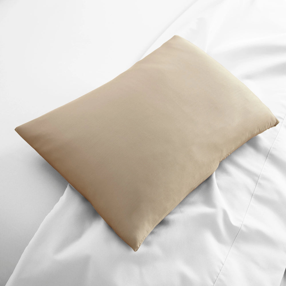 taupe bamboo lumbar pillowcase from the Signature Collection, displayed flat on white bedding with sateen finish and soft texture