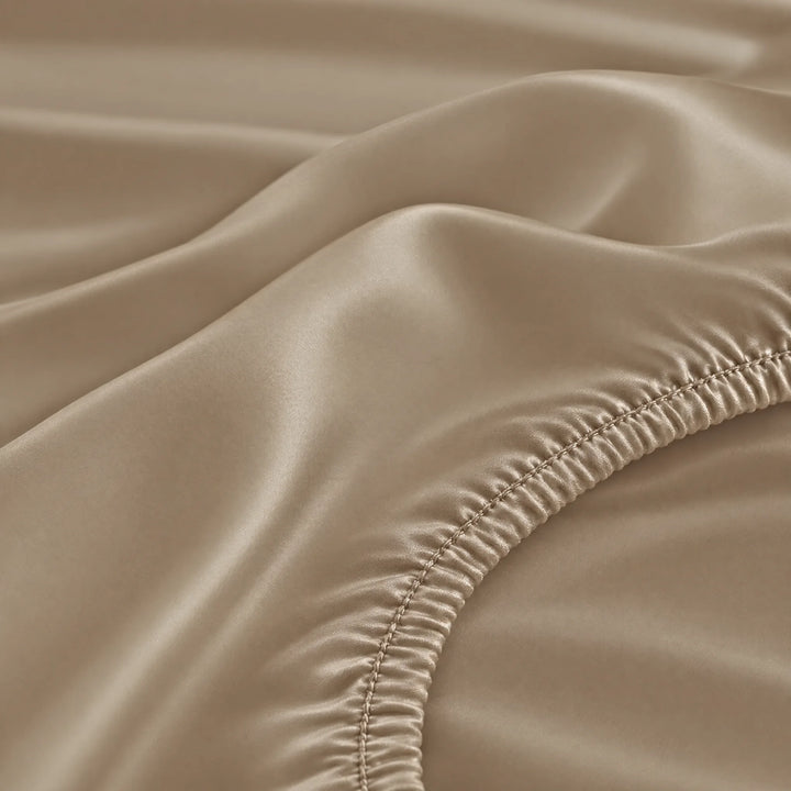 Taupe bamboo viscose fitted sheet stitched elastic hem macro close-up of smooth silky sateen, from the sheet set