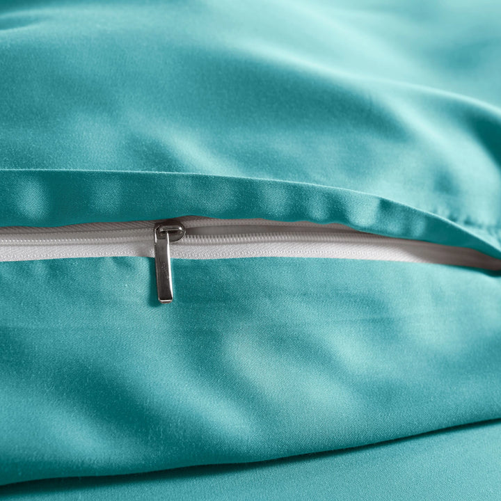 close-up of tiffany blue bamboo pillowcase with hidden tiffany blue zipper and smooth sateen finish